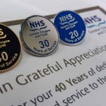 Enamel infilled long service pin badges, supplied mounted on a presentation card.