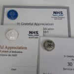 Card mounted long service pin badges