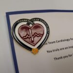 Card mounted 'thank you' card mounted pin badge
