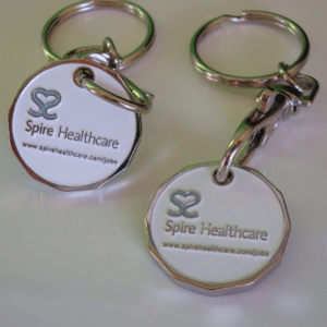 Enamel infilled trolley coins