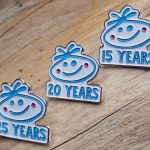 Enamel infilled pin badges